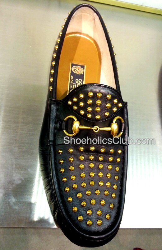gold studded loafers